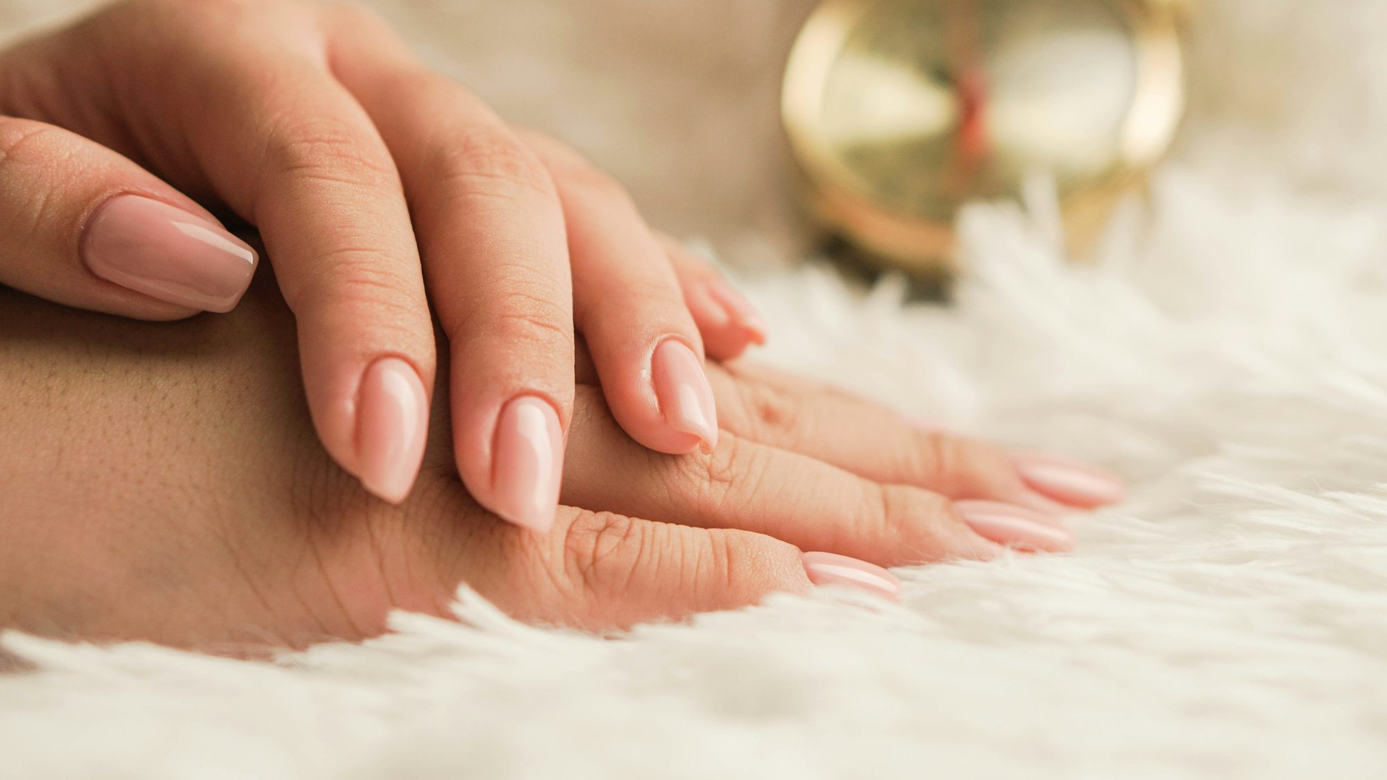 Soft glossy nude gel manicure