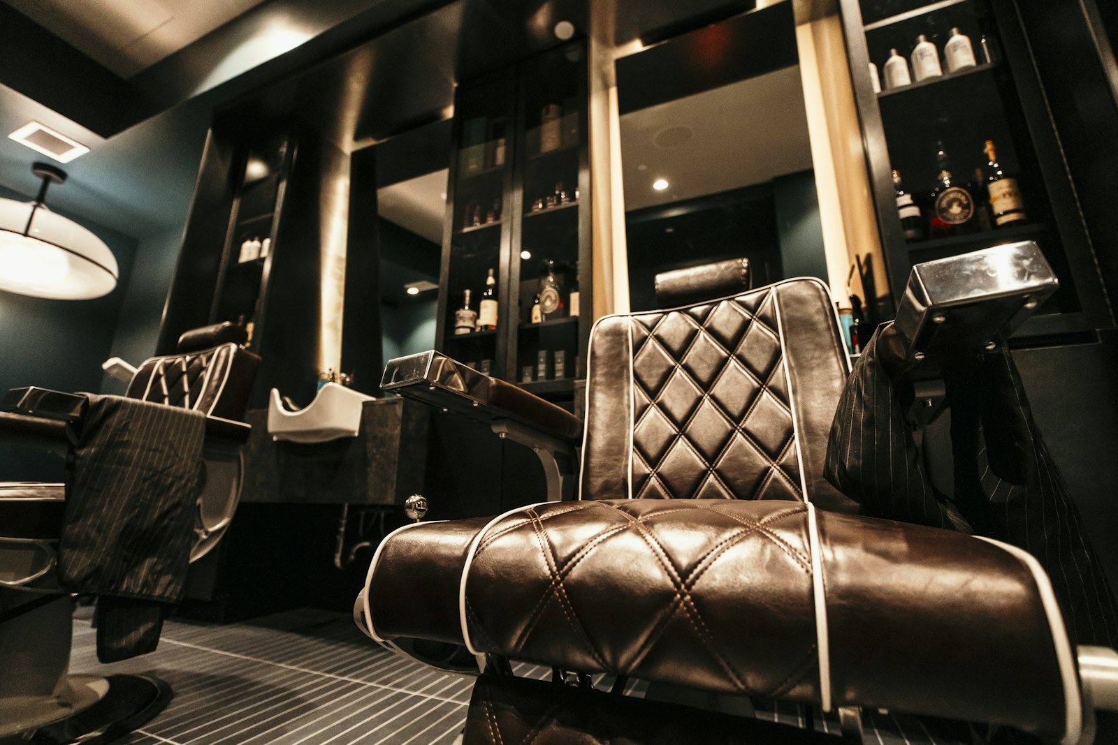 Barbershop checkerboard floor and leather chairs