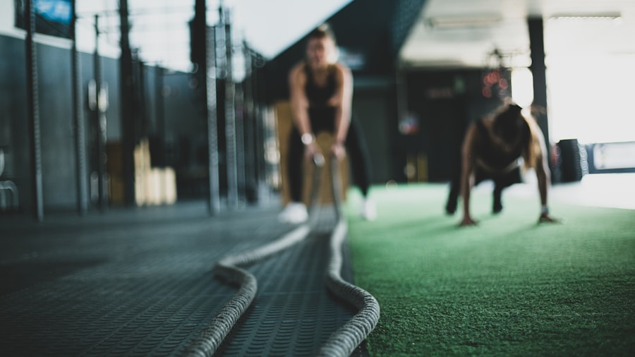 Members training with battle ropes during a Small-Group Conditioning session